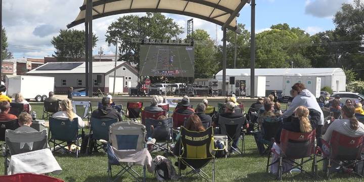 Community watches Cy-Hawk game at watch party with Kid Captain