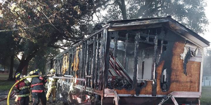 Dog dies and mobile home deemed total loss following early morning fire on Jim Pickens Rd.