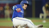 Blue Jays’ Dalton Varsho hits monster grand slam amid heated AL East race