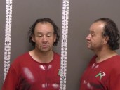 Man arrested after police track stolen vehicle to Fargo