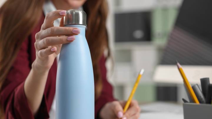 Declutter All The Water Bottles In Your Cabinets With One Smart & Affordable Hack