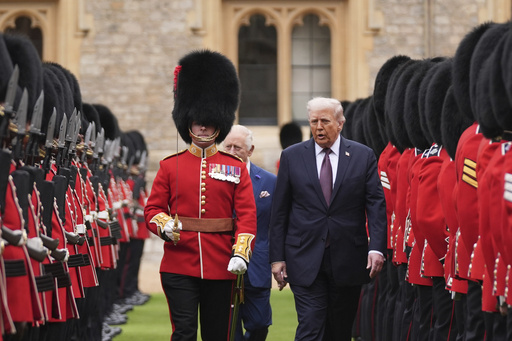 The Latest: As Trump enjoys UK royal pageantry, critics warn of a 'dangerous moment' in US