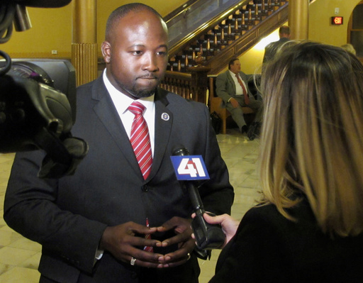 Kansas deputy charged with murder in the death of a man in custody