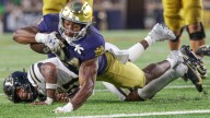 Price’s four touchdowns power No. 24 Notre Dame to 56