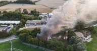Firefighters rush to large aircraft hangar blaze in Cambridgeshire village