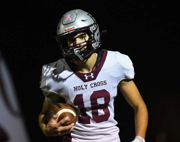 Reilley throws and runs Holy Cross past Buena -