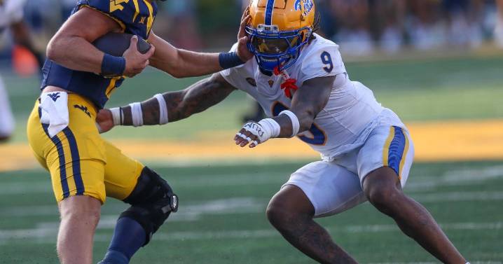 West Virginia stuns Pitt in comeback Backyard Brawl win