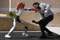 Humanoid robots showcase skills at Ancient Olympia. But they’re on a long road to catch up to AI