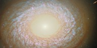 This feathery galaxy refuses to be defined even in new Hubble telescope images