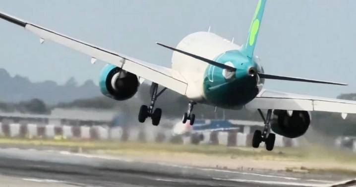 String of planes filmed abandoning landings in high winds