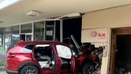 Person hospitalized after car crashes into building in NH