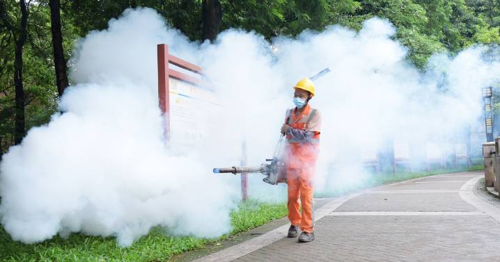 China battles mosquito-borne virus with Covid-era methods as U.S. issues travel warning