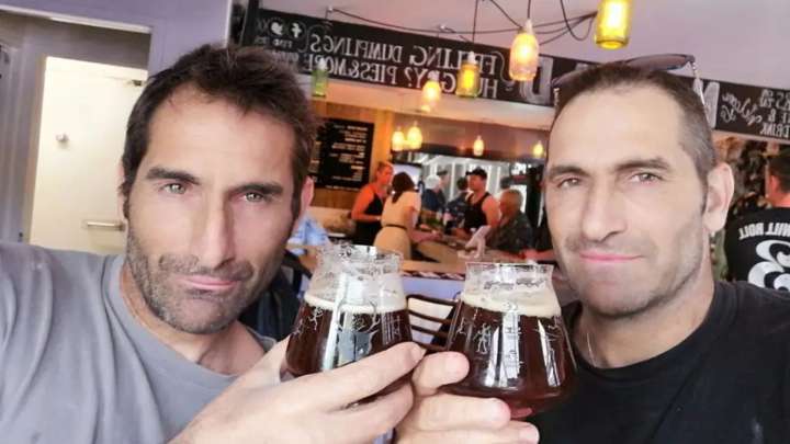 Twin of surfer dad mauled to death by 20ft shark speaks out after laying brother to rest...and reveals sweet detail
