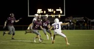 Red Devils' run game and defense stymies Bearcats