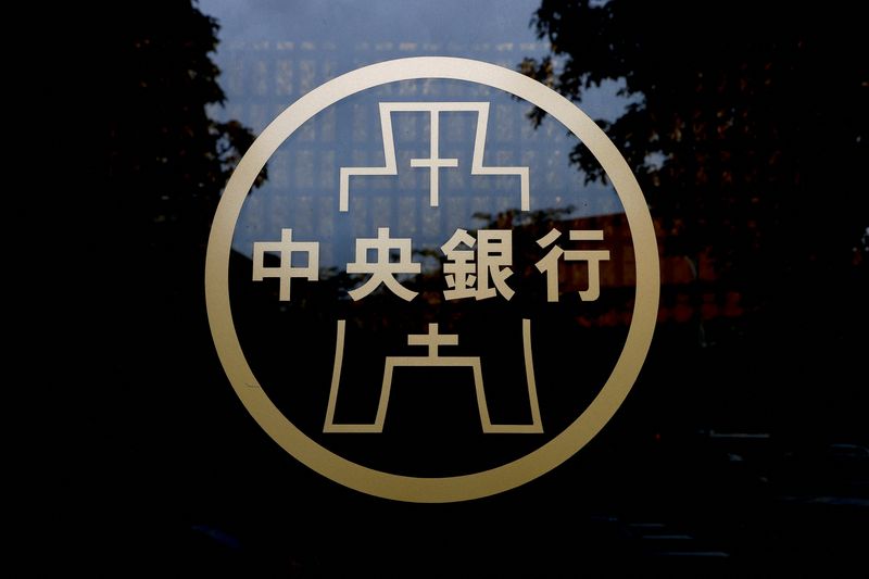 Taiwan central bank raises growth forecast, leaves rate unchanged