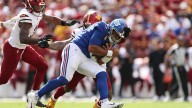 Commanders hold down Russell Wilson in his NY Giants debut
