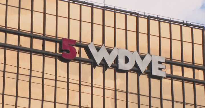 Iconic 102.5 WDVE sign being taken down from Green Tree building