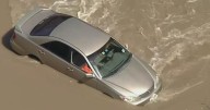 Driver arrested after water rescue in North Texas