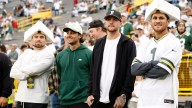 Members of the Brewers show up to the Packers game at Lambeau Field