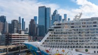 Norwegian Cruise Line's Escape Ship Finally Arrives In New York City Under The Aid Of Multiple Tugboats