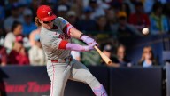 Phillies stay persistent in chaotic win over Brewers