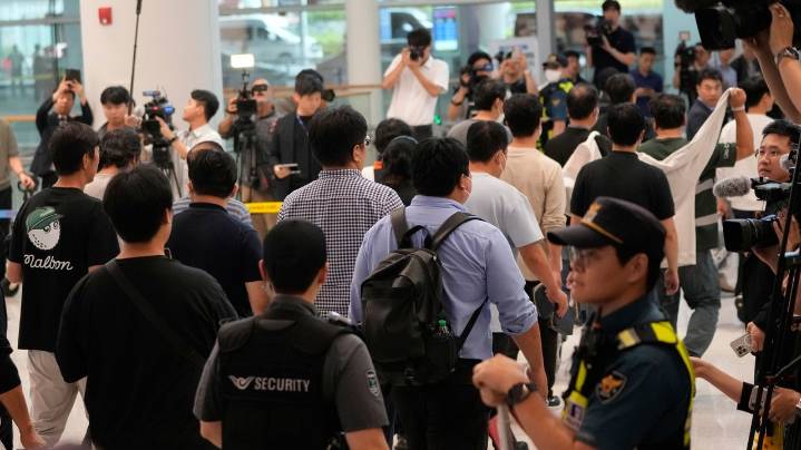 South Korean workers return home after days in detention following US immigration raid