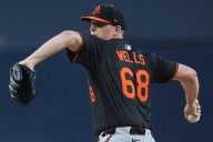 New dad Tyler Wells leads Orioles to 6