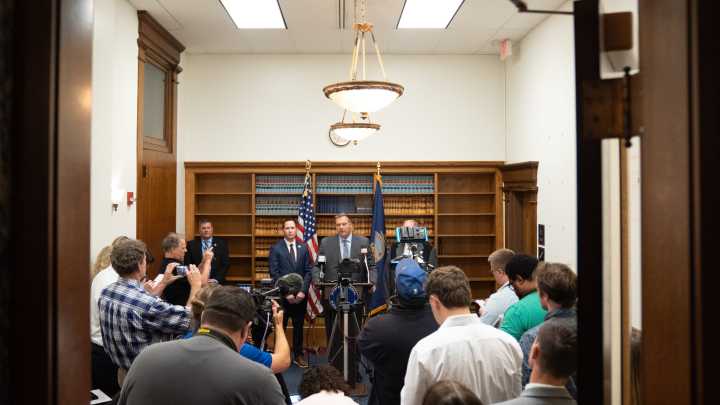Kobach says funding loss is imminent. Feds disagree