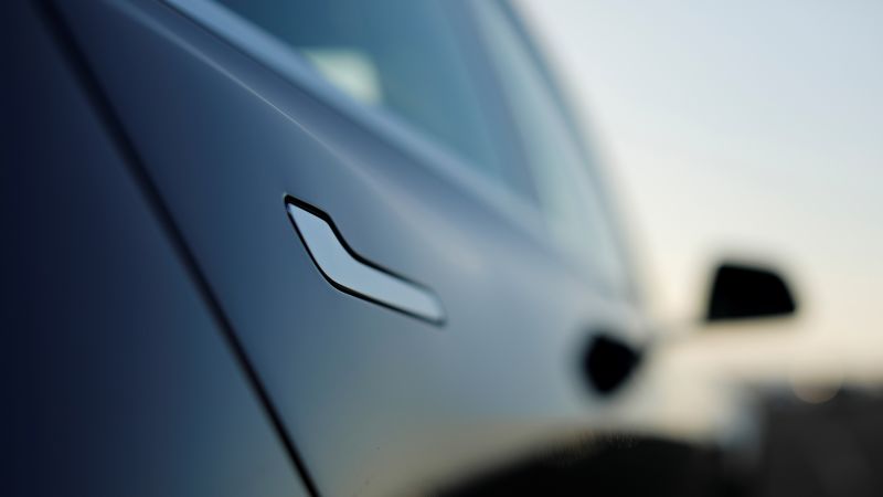 Tesla is looking to redesign its door handles following trapped