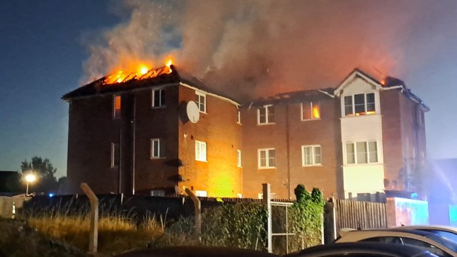 Fire rips through block of flats in London with 70 firefighters scrambled to scene