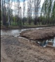 Desvíos en la ex Ruta 234 de Centenario por inundación tras rotura de un puente