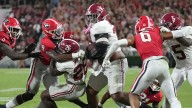 Alabama lineman weighing 365lbs has fans 'jumping out of seat' after 'terrifying' screen pass play call against Georgia