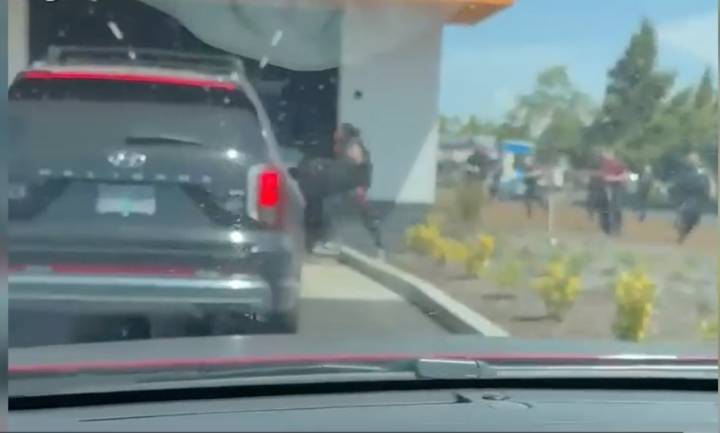 Detective shot armed man in back to prevent harm to car wash occupants, DA finds
