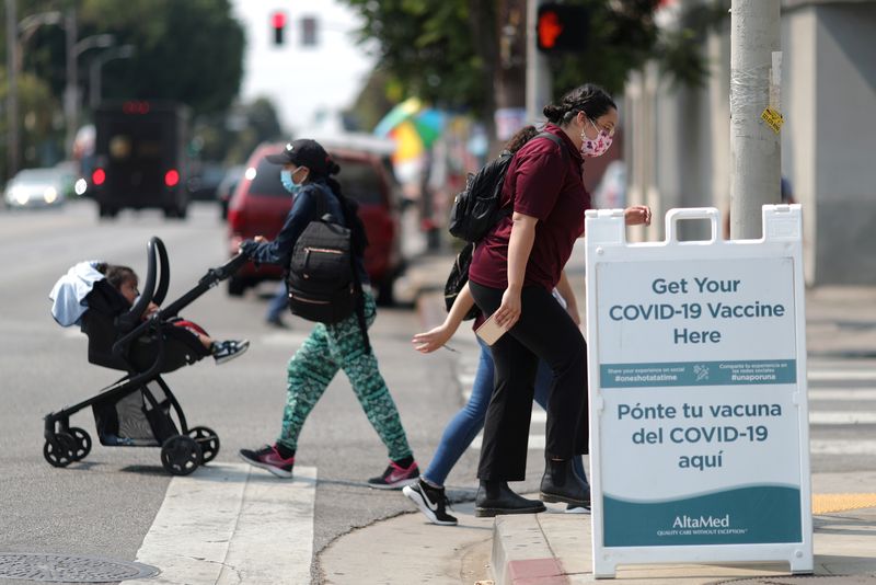 West Coast states recommend COVID shots for all adults and children, breaking with federal policy