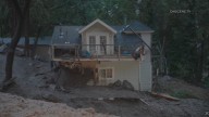 Mudslides damage homes, bury roads and cars in Southern California