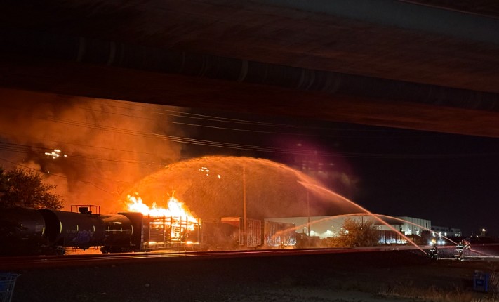 Crews extinguish train fire in North Highlands, roads closed