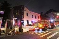 FDNY responds to early morning house fire in Stapleton on Thursday
