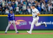 Mariners' Cal Raleigh slugs his way to 60