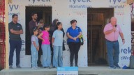 From hope to home | Louisville family moves into first house with Habitat volunteers
