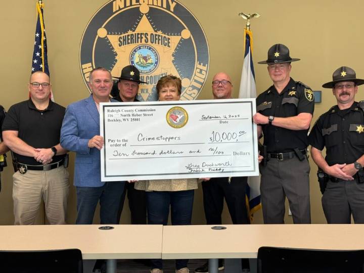 Raleigh County Sheriff, Commission present $10,000 to Crime Stoppers of WV