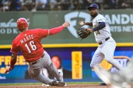 MLB roundup: Reds make NL wild card despite loss to Brewers