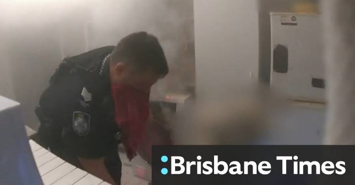 Officers rescue elderly woman in wheelchair from burning home