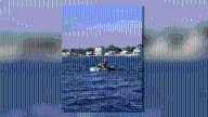 Clinton first responders rescue sailor from capsized sailboat