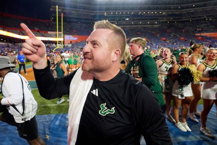 USF football team honors late basketball coach Abdur