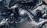 Hurricane Kiko weakens into a tropical storm but still could create dangerous surf in Hawaii