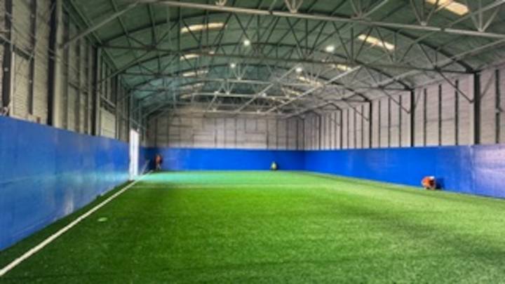 An Onondaga County high school football coach is opening an indoor sports center