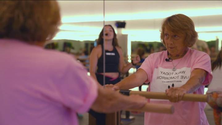 Paralyzed woman walks a mile, raises $1,000 for camper sponsorship