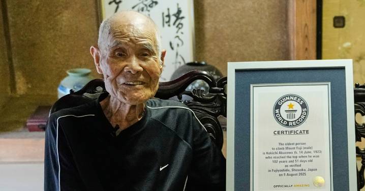 Japanese man becomes oldest to summit Mount Fuji at 102 with help from his family