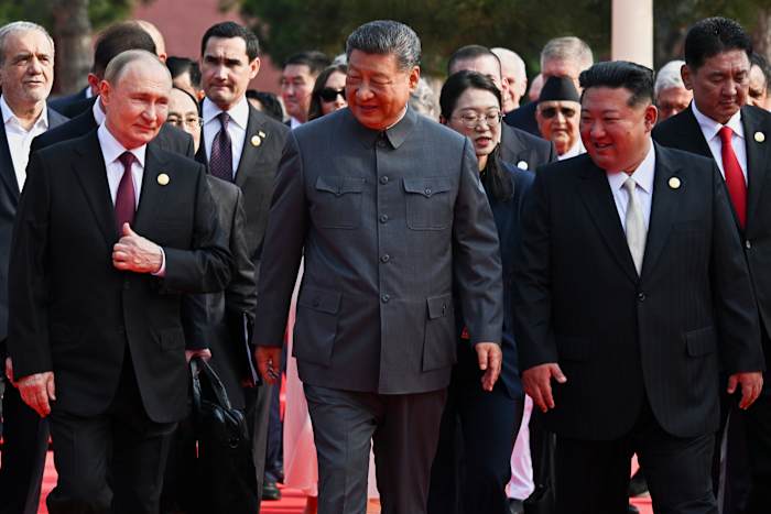 A summit and parade in China may signal a geopolitical shift. They might also be political jockeying
