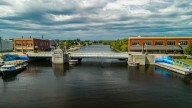 Bridge mural creates vibrant waterway entry into Up North downtown